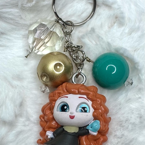 Disney Other - Merida from Brave. Disney Doorable keychain with bubble gum beads.